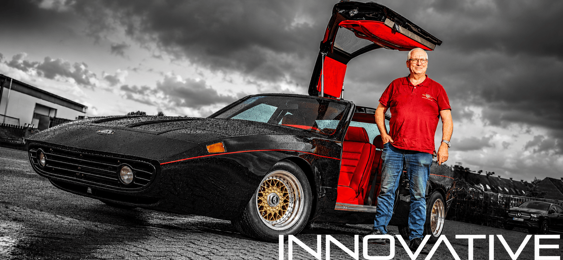 Chris Hahn next to an SGS gullwing